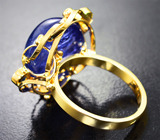 Золотое кольцо с крупным насыщенным танзанитом 19,26 карата, синими сапфирами и бриллиантами Золото