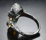 Серебряное кольцо с ограненными черными опалами 4,85 карата и цаворитами  Серебро 925