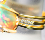 Крупное авторское золотое кольцо с разных форм опалами 14,1 карата, цаворитами, красными сапфирами и бриллиантами Золото