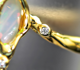 Золотое кольцо с крупным кристаллическим эфиопским опалом 16,05 карата и бриллиантами