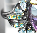 Серебряное кольцо с аметистом 27,51 карата и голубыми топазами