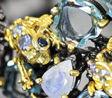 Серебряный браслет с резным аметистом 63,3 карата, голубыми топазами, лунным камнем, танзанитами и синими сапфирами Серебро 925