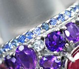 Серебряное кольцо с ярким рубином, уругвайскими аметистами, синими сапфирами и топазами