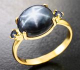 Золотое кольцо cо звездчатым 5,61 карата и синими сапфирами Золото