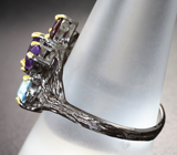 Серебряное кольцо с голубыми топазами, аметистами и родолитами