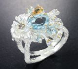 Серебряное кольцо с голубыми топазами, цитрином и танзанитом