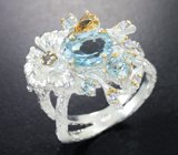 Серебряное кольцо с голубыми топазами, цитрином и танзанитом