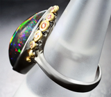 Серебряное кольцо с кристаллическим черным опалом 10,09 карата и сапфирами бриллиантовой огранки