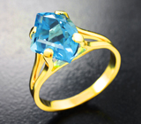 Золотое кольцо с голубым топазом авторской огранки 4,77 карата