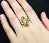 Ажурное серебряное кольцо с ограненным эфиопским опалом и разноцветными сапфирами