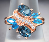 Чудесное серебряное кольцо с насыщенно-синими топазами и «неоновыми» апатитами  Серебро 925