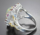 Серебряное кольцо с кристаллическим эфиопским опалом 1,44 карата и родолитами 