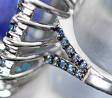 Серебряное кольцо с танзанитом 9,81 карата, топазами и синими сапфирами бриллиантовой огранки