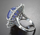 Серебряное кольцо с танзанитом 9,81 карата, топазами и синими сапфирами бриллиантовой огранки