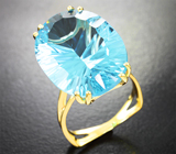 Золотое кольцо с голубым топазом лазерной огранки 19,21 карата Золото