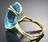 Золотое кольцо с голубым топазом лазерной огранки 19,21 карата Золото