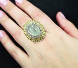 Серебряное кольцо с рутиловым пренитом 11,75 карата, перидотами и голубыми топазами