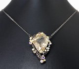 Серебряное колье с рутиловым кварцем 49,45 карата, аметистами и танзанитами