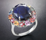 Серебряное кольцо с крупным насыщенно-синим 8,64 карата и разноцветными сапфирами