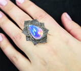 Серебряное кольцо с кристаллическим эфиопским опалом 10,54 карата и синими сапфирами бриллиантовой огранки