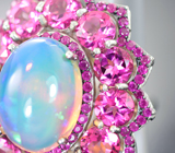 Серебряное кольцо с кристаллическим эфиопским опалом 6,9 карата, розовыми топазами и рубинами