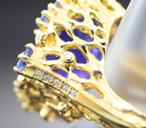 Массивное авторское золотое кольцо с танзанитами 18,42 карата и бриллиантами