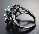 Серебряное кольцо с голубым топазом и альмандинами гранатами Серебро 925