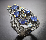 Серебряное кольцо с кианитами и голубыми топазами
