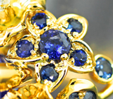 Массивное золотое кольцо с крупным ярким насыщенным танзанитом 8,43 карата, сапфирами и бриллиантами Золото