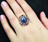 Серебряное кольцо с синим сапфиром 11,14 карата и аметистами
