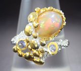 Серебряное кольцо с кристаллическим эфиопским опалом и танзанитами