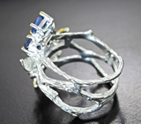 Серебряное кольцо с кианитами и голубым топазом