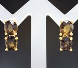 Золотые серьги с гранатами со сменой цвета 7,8 карата