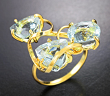 Объемное золотое кольцо с аквамаринами различных огранок 11,66 карата