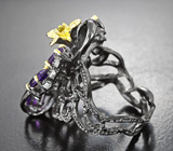 Серебряное кольцо с аметистами, голубыми топазами и желтым турмалином Серебро 925