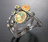 Серебряное кольцо с кристаллическими эфиопскими опалами и желтым турмалином