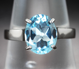 Классическое серебряное кольцо с голубым топазом Серебро 925