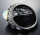 Серебряное кольцо с кристаллическим эфиопским опалом и голубым топазом Серебро 925
