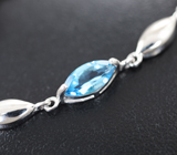 Изысканный серебряный браслет с аметистами и голубыми топазами