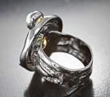Серебряное кольцо с кристаллическими эфиопскими опалами 1,37 карата и желтым турмалином