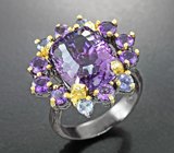 Серебряное кольцо с аметистом лазерной огранки 8,67 карата, малыми аметистами и танзанитами