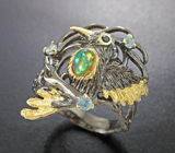 Серебряное кольцо с кристаллическим эфиопским опалом и голубыми топазами Серебро 925