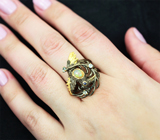 Серебряное кольцо с кристаллическим эфиопским опалом и голубыми топазами Серебро 925