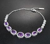 Впечатляющий серебряный комплект с аметистами