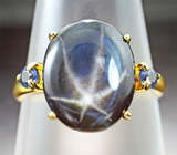 Золотой кольцо cо звездчатым 7,83 карата и голубыми сапфирами Золото