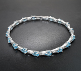Стильный серебряный браслет с голубыми топазами