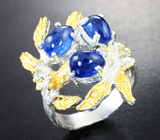 Серебряное кольцо с ярко-синими сапфирами и голубыми топазами