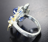Серебряное кольцо с ярко-синими сапфирами и голубыми топазами