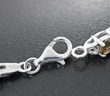 Оригинальный серебряный браслет с дымчатым кварцем и родолитами
