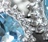 Крупные серебряные пусеты с ярко-голубыми топазами